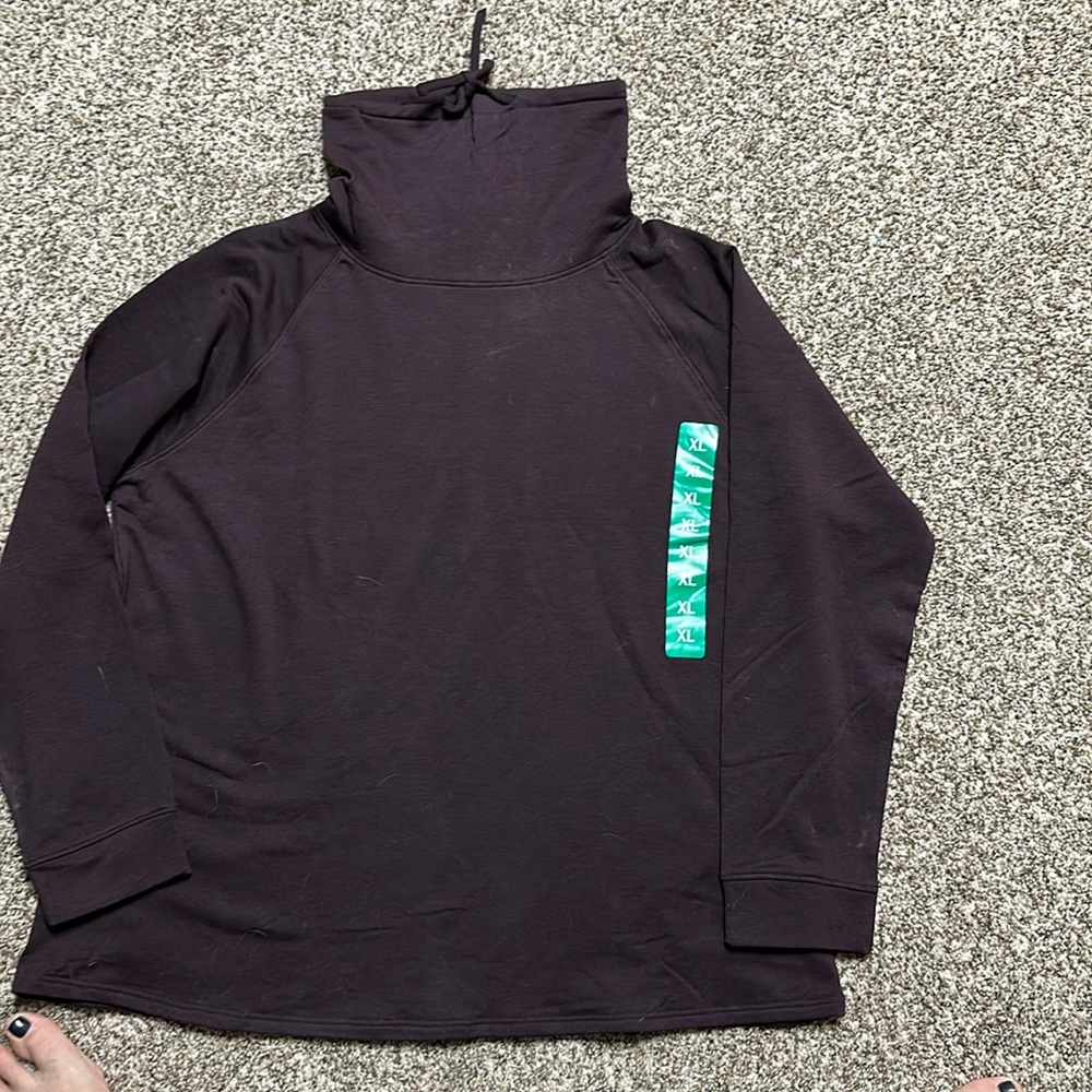 Women’s size XL turtle neck sweat shirt from Costco.